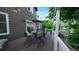 Back deck with outdoor seating includes a patio table and chairs and string lighting for cozy evenings at 5150 Morning Glory Pl, Highlands Ranch, CO 80130