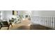 Bright living room with soaring ceilings, neutral décor, and an open floor plan to the adjacent dining area at 5150 Morning Glory Pl, Highlands Ranch, CO 80130