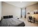 Bedroom with neutral colored walls, one window, and a desk at 2159 Indian Balsam Dr, Monument, CO 80132