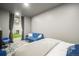 Bedroom with a view into the recreation room, offering flexible space at 2159 Indian Balsam Dr, Monument, CO 80132