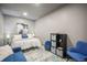 Comfortable bedroom with a cozy seating area and stylish decor at 2159 Indian Balsam Dr, Monument, CO 80132