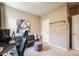 Compact bedroom featuring a futon and computer setup, perfect for gaming or work at 2159 Indian Balsam Dr, Monument, CO 80132