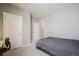 Bedroom with neutral colored walls, carpeted floor, and closet at 2159 Indian Balsam Dr, Monument, CO 80132