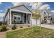 Charming home with a covered porch and stone accents at 2159 Indian Balsam Dr, Monument, CO 80132
