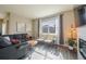 Cozy living room with comfortable seating, natural light, and stylish decor at 2159 Indian Balsam Dr, Monument, CO 80132