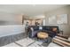 Open concept living area flows into the bright kitchen and dining room at 2159 Indian Balsam Dr, Monument, CO 80132
