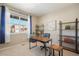 Well-lit office space with a large window and modern furnishings at 2159 Indian Balsam Dr, Monument, CO 80132
