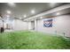 Large recreation room with artificial turf and ample space at 2159 Indian Balsam Dr, Monument, CO 80132