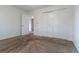 This bedroom offers a closet and a neutral color palette at 8463 Everett Way # B, Arvada, CO 80005