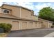 Exterior of home features garage access and neutral colors at 8463 Everett Way # B, Arvada, CO 80005