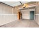Spacious garage with overhead lighting and plenty of room for storage at 3872 S Dallas St # 7-304, Aurora, CO 80014