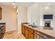 Kitchen boasts granite countertops, stainless steel appliances, and wood cabinetry at 3872 S Dallas St # 7-304, Aurora, CO 80014