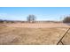 View of ballfield with bleachers and view of homes in the distance at 1113 W 112Th Ave # B, Denver, CO 80234