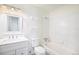 Bright bathroom with a tub and shower combination, a vanity, and a white toilet at 1113 W 112Th Ave # B, Denver, CO 80234
