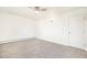 Bedroom featuring soft carpeting, a ceiling fan, and a convenient closet for optimal storage at 1113 W 112Th Ave # B, Denver, CO 80234