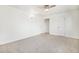 Spacious bedroom features carpeting, a ceiling fan, closets, and natural light at 1113 W 112Th Ave # B, Denver, CO 80234