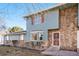 Charming two-story home featuring blue siding and stone accents at 1113 W 112Th Ave # B, Denver, CO 80234