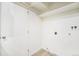 Laundry area with white cabinets and shelving at 1113 W 112Th Ave # B, Denver, CO 80234