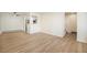 Bright living room with light wood floors and a ceiling fan at 1113 W 112Th Ave # B, Denver, CO 80234