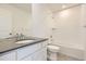 Clean bathroom featuring tub, shower, and modern vanity at 6740 Juniper Dr, Thornton, CO 80602