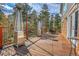 Spacious back deck with patio heaters, perfect for entertaining outdoors year-round at 4574 Picutis Rd, Indian Hills, CO 80454