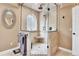Beautiful bathroom featuring a glass shower with mosaic tile and a built-in bench at 4574 Picutis Rd, Indian Hills, CO 80454