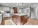 Spacious kitchen with stainless appliances and large island at 4574 Picutis Rd, Indian Hills, CO 80454