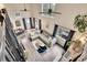 Open living space with vaulted ceilings, natural light, modern decor, and views from the second story at 4574 Picutis Rd, Indian Hills, CO 80454