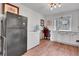 Efficient pantry area with ample counter space, storage, and additional refrigerator and freezer at 4574 Picutis Rd, Indian Hills, CO 80454
