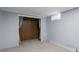 Unfinished basement with closet and window at 502 E Lake Ave, Centennial, CO 80121