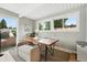 Dining area with natural light, modern furnishings, and views at 1440 S Clermont St, Denver, CO 80222