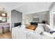 Bright living room with a fireplace, modern decor and open floorplan at 1440 S Clermont St, Denver, CO 80222
