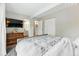 Spacious main bedroom with a large closet and view into the en suite bathroom at 1440 S Clermont St, Denver, CO 80222