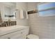 Modern bathroom features designer tiles and vanity at 4835 Grove St, Denver, CO 80221