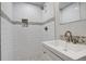 Modern bathroom featuring a stylish vanity, shower, and sleek fixtures that combine form and function at 4835 Grove St, Denver, CO 80221