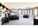 room with mountain mural, multiple windows, and modern furnishings at 4041 E Forbes Ct, Greenwood Village, CO 80121