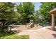 Community playground with slides, climbing structures, and a soft landing surface, providing outdoor fun at 4041 E Forbes Ct, Greenwood Village, CO 80121