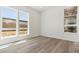 Bright bedroom with wood floors and large windows at 11475 E Briarwood Cir, Centennial, CO 80112