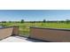 An outdoor patio offering a serene view of a green golf course at 11475 E Briarwood Cir, Centennial, CO 80112