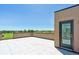This outdoor patio offers an open space to enjoy the weather and skyline views at 11475 E Briarwood Cir, Centennial, CO 80112
