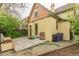 Backyard features a patio, grill, and lush greenery, offering a perfect space for outdoor entertaining at 2227 N Gilpin St, Denver, CO 80205