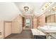 Bathroom with retro design, featuring a built-in tub, and linen cabinet at 2227 N Gilpin St, Denver, CO 80205
