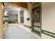 Inviting front porch with classic architectural details and a secure decorative security door for added charm at 2227 N Gilpin St, Denver, CO 80205