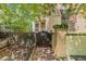 Charming home with a 'Beware of Dog' sign on the front gate adding a touch of character at 2227 N Gilpin St, Denver, CO 80205