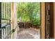 Cozy patio area offering a secluded outdoor space surrounded by lush greenery at 2227 N Gilpin St, Denver, CO 80205