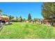 Expansive grassy backyard with full fence, ideal for recreation and enjoying the outdoors at 1093 Lilac Cir, Broomfield, CO 80020