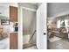 A glimpse of the basement stairs, living room, and kitchen in this inviting home at 1093 Lilac Cir, Broomfield, CO 80020