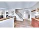 Inviting entryway with wood floors, staircase, and neutral tones, creating a warm and welcoming atmosphere at 1093 Lilac Cir, Broomfield, CO 80020