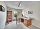 Room with plush carpet, a large desk, and a window with outside views at 1093 Lilac Cir, Broomfield, CO 80020