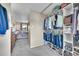 Convenient walk-in closet with plenty of shelving and rod space for storage at 1093 Lilac Cir, Broomfield, CO 80020